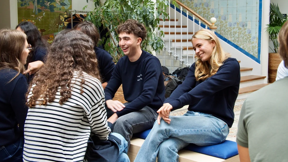 Albert School students laughing together on campus